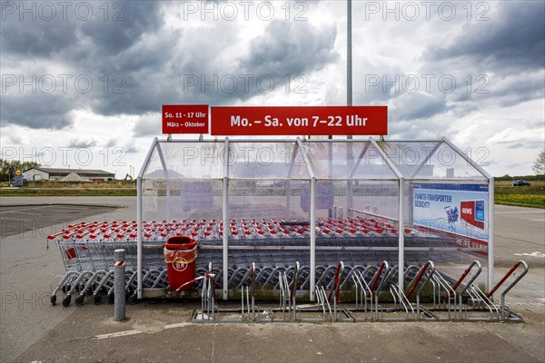 Shopping trolley in a REWE car park