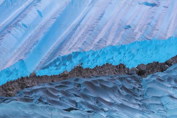 Blue ice abstract close-up of the Negribreen glacier at Spitsbergen