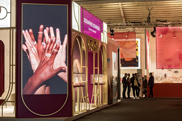 Video wall with precious rings on womans hands