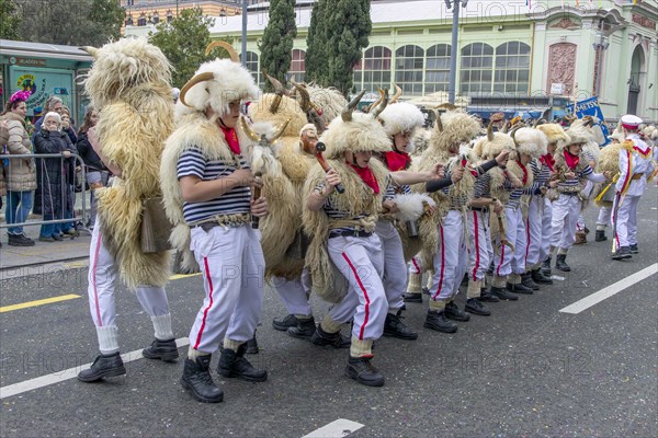 Traditional bell ringer masks in sailors mother