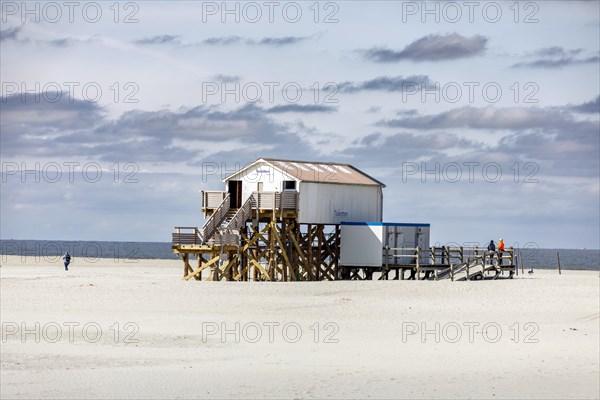 Sankt Peter-Ording beach with the typical pile dwellings