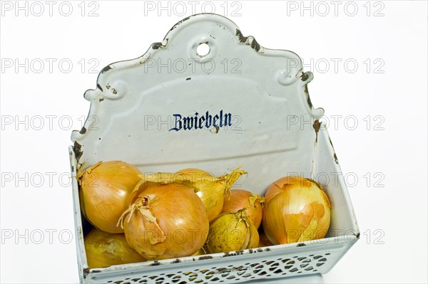 Onions in a metal onion box