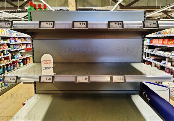 Empty shelves in supermarket