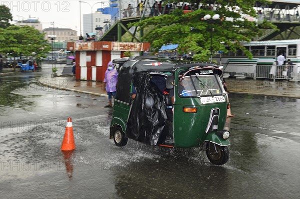 Tuktuk in the pouring rain