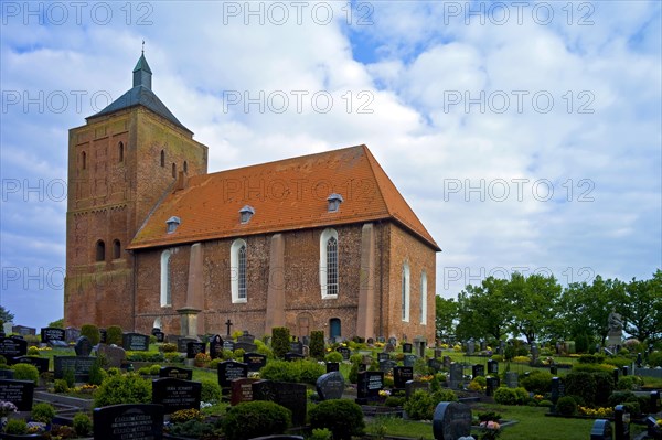 The church in Osteel with the cemetery