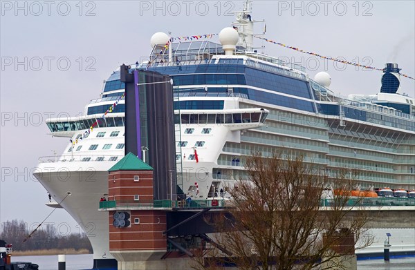 The Celebrity Eclipse passing the Jann Berghaus Bridge in Leer