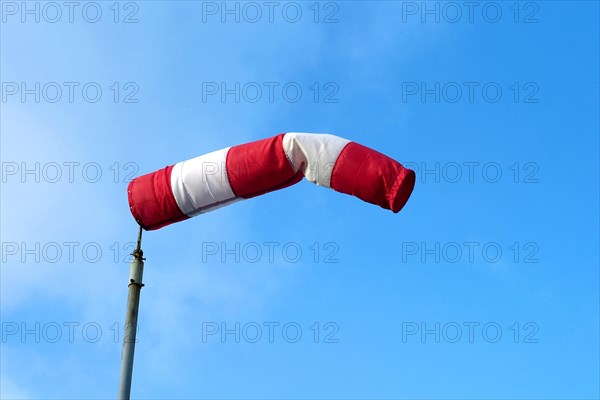 Windsock against a blue sky