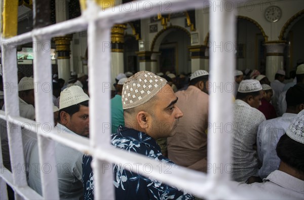 Indian Muslims perform the second Friday prayer in the holy month of Ramadan at a Mosque in Guwahati