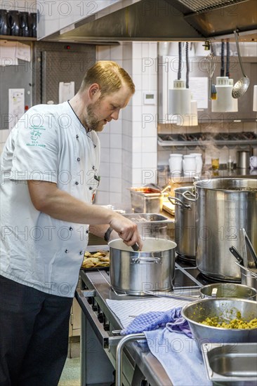 Chef during the preparation of dishes