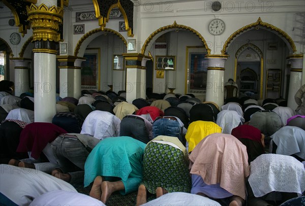 Indian Muslims perform the second Friday prayer in the holy month of Ramadan at a Mosque in Guwahati