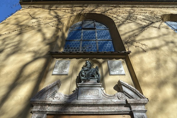 Bust of St. Mark above the entrance portal of the St. Makus Church in the Jakob Fugger Settlement