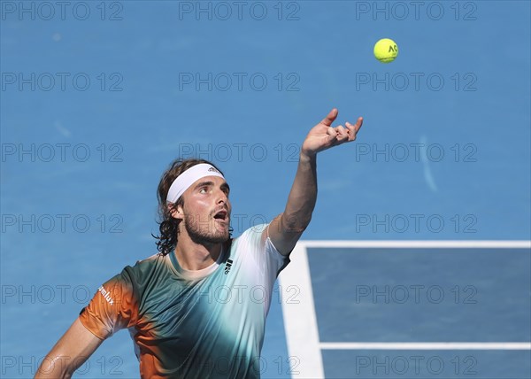 Greek tennis player Stefanos Tsitsipas serves during the 2022 Australian Open at Melbourne Park