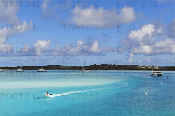 Sailboats anchor off Warderick Wells