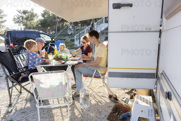 Subject: Family with grandfather camping