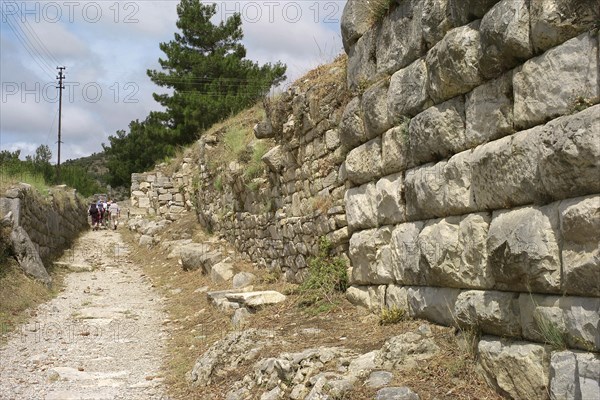 Tour group walking along the city wall