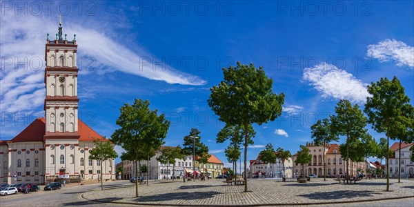 Lively scene in front of the town church on the historic market square of Neustrelitz