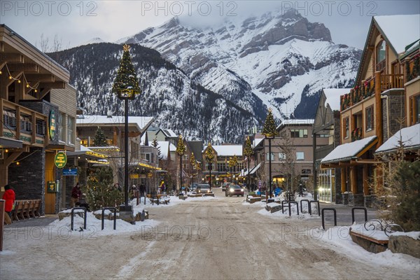 Winter street with Christmas decorations in Banff