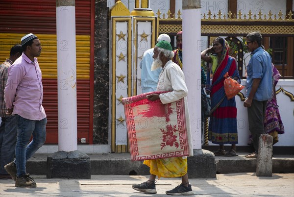 Indian Muslims arrives to perform the second Friday prayer in the holy month of Ramadan at a Mosque in Guwahati