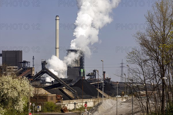 Steam cloud of the coking plant of Huettenwerke Krupp Mannesmann - HKM