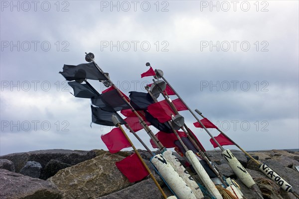 Fishermens marker buoys on the shore of Vitt