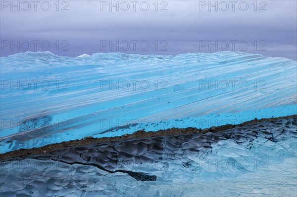 Blue ice abstract close-up of the Negribreen glacier at Spitsbergen