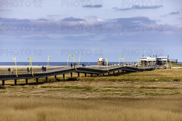 Pier to the typical pile dwellings of Sankt Peter-Ording