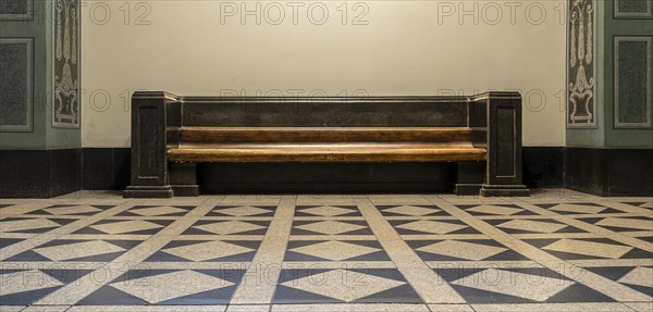 Wooden bench in retro style in the vestibule of Spandau Town Hall