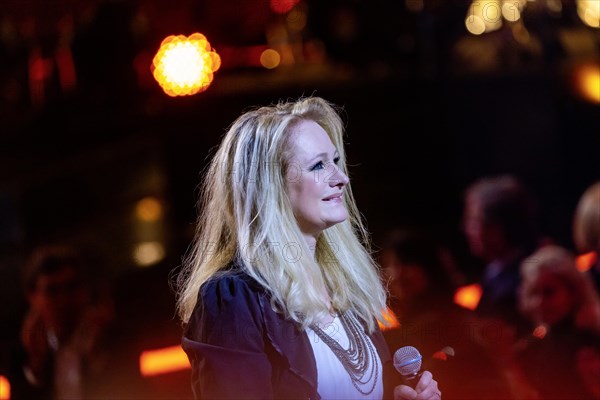 Singer Nicole performing on stage. 50 years of ZDF Hitparade