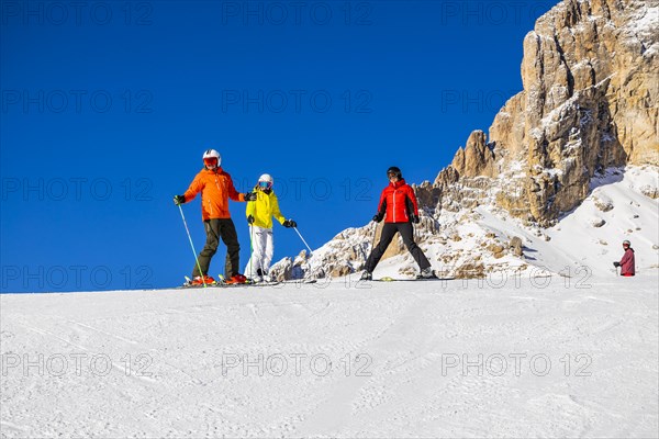 Skiers in the Val Gardena Dolomiti Superski ski area South Tyrol