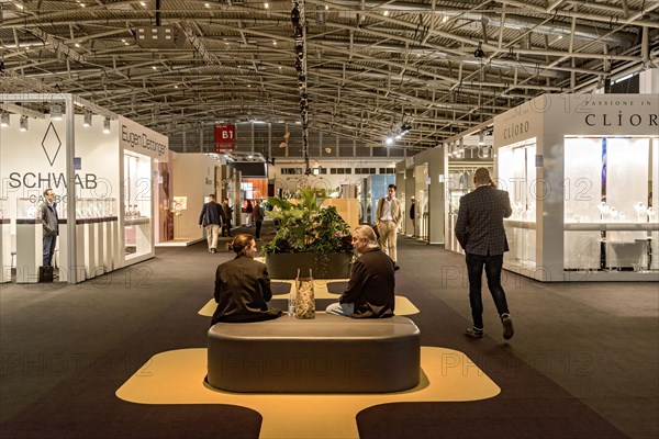 Walkway in exhibition hall with visitors