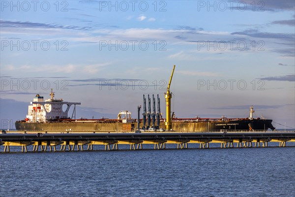Crude oil tanker Landbridge Prosperity at the discharge bridge of the NWO in the Jade Bay