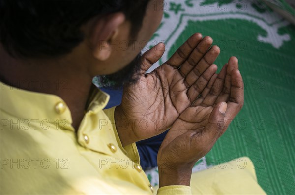 Indian Muslims perform the second Friday prayer in the holy month of Ramadan at a Mosque in Guwahati