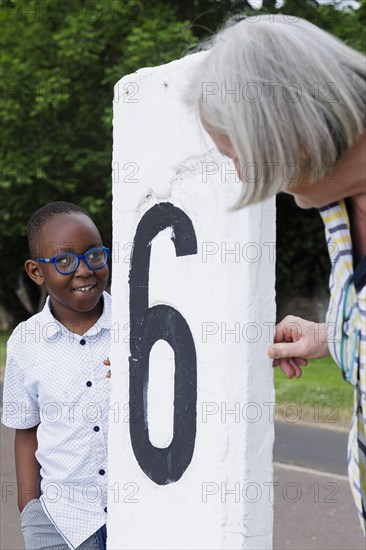 Temporary grandmother. Temporary grandmother cares for a boy from Africa for a few hours a week on a voluntary basis.