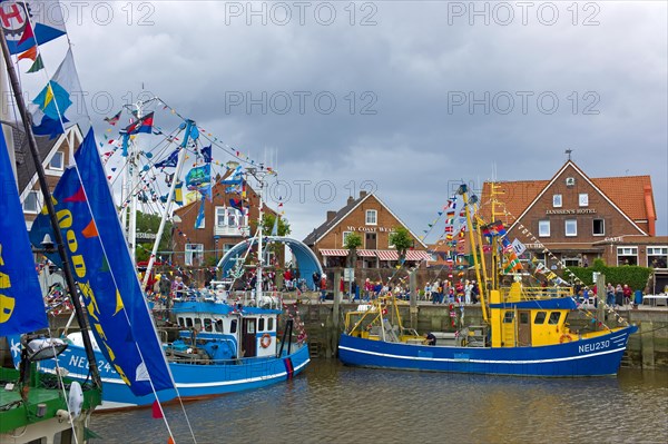 Decorated crab cutter in the harbour of Neuharlingersiel