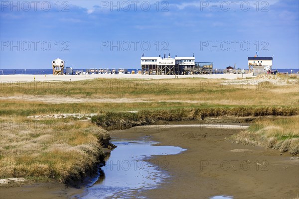 Sankt Peter-Ording beach with the typical pile dwellings