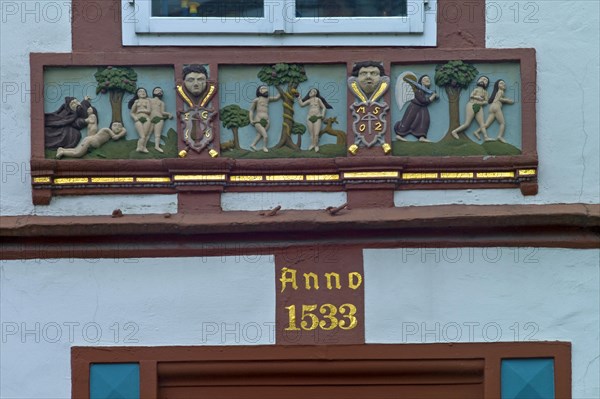 Religious relief on a half-timbered house
