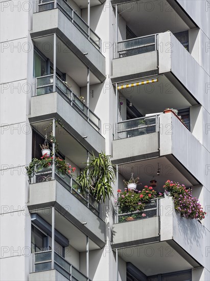 Concrete balconies with geraniums
