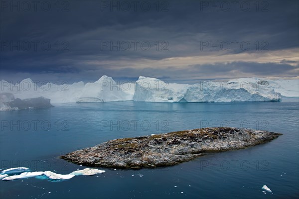 Icebergs at sunset in the Kangia icefjord