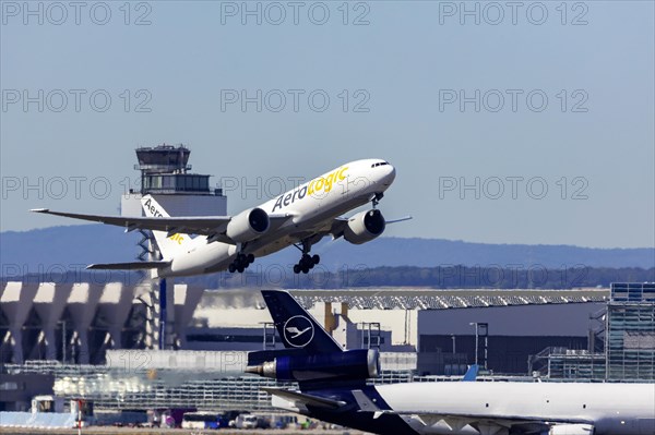 Boeing 777F of the airline AeroLogic during take-off at Fraport Airport