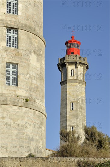 The old Tour Vauban and the new lighthouse Phare des Baleines on the island Ile de Re