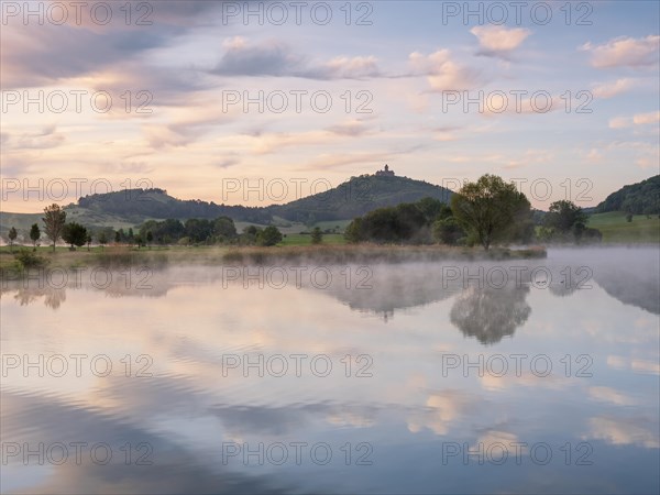 Landscape with lake at dawn