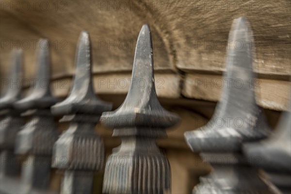 Iron fence in front of a building