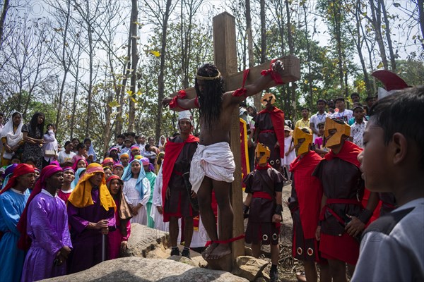 Christian devotees during the annual Good Friday procession to re-enact the crucifixion of Jesus Christ on April 7