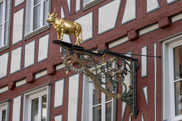 Nose sign with bull figure on half-timbered house Hotel Restaurant Ochsen