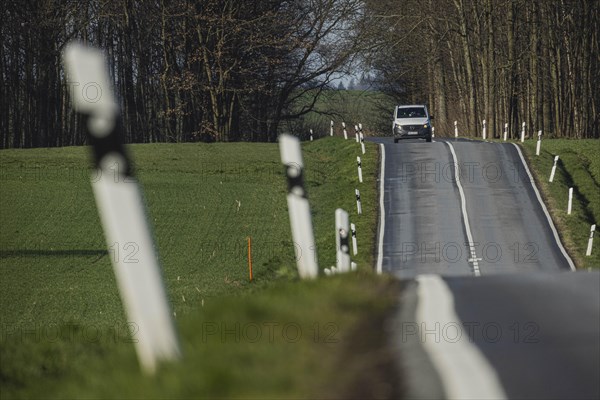 A company car on a country road