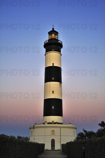 The lighthouse phare de Chassiron at sunset near Saint-Denis-dOleron on the island Ile dOleron