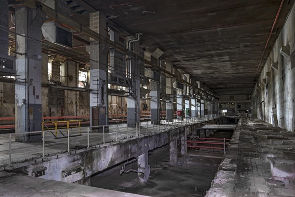 Empty stacked production halls of a former paper factory