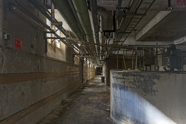 Supply lines in the basement of a former paper factory