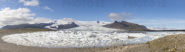 View over the glacier lake Fjallsarlon and Icelandic glacier Fjallsjoekull