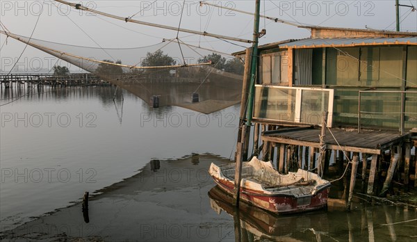 Fishing nets over a canal near Comacchio in the Po Delta